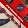Folding ruler with level